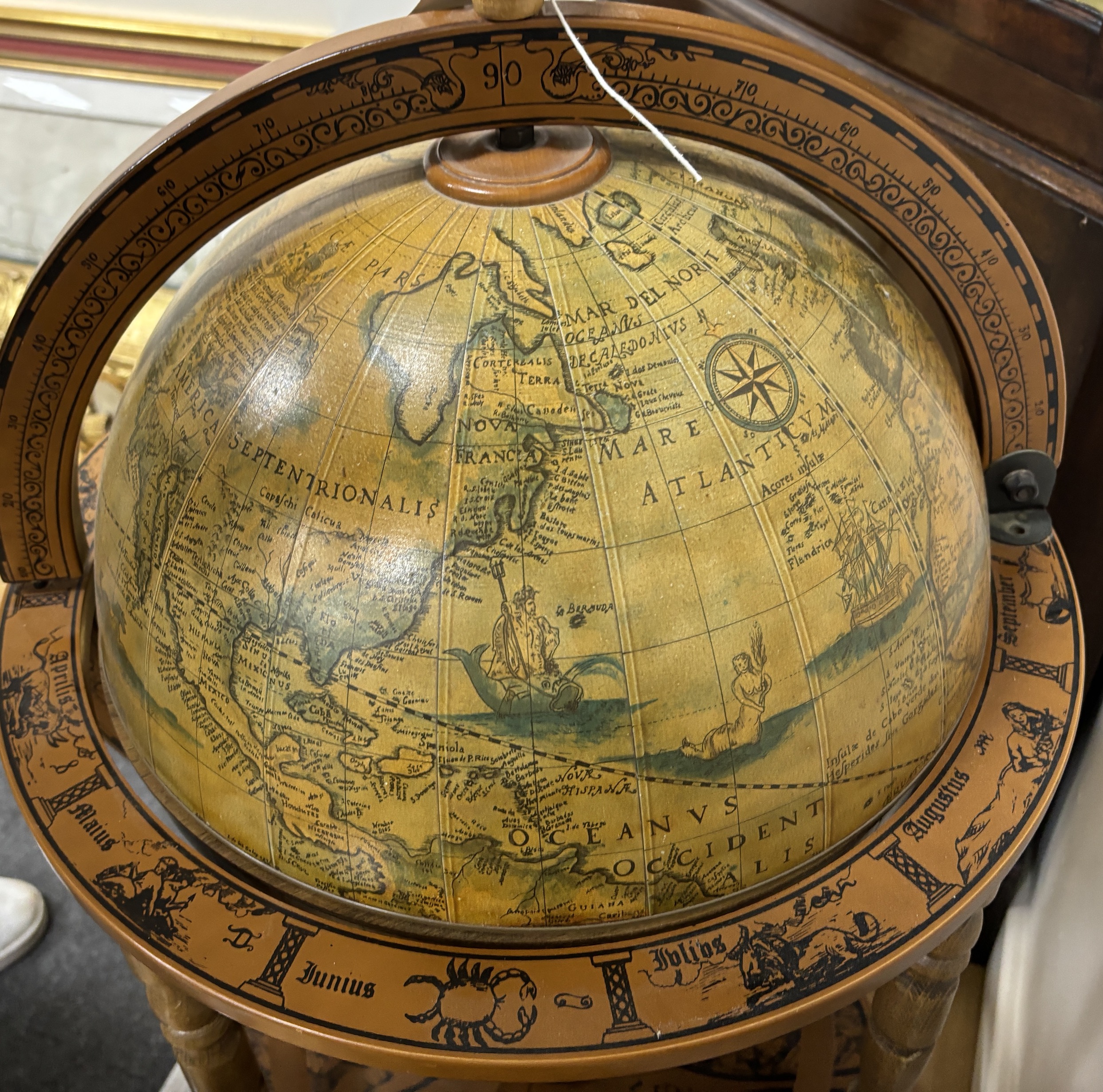 A reproduction globe drinks trolley, height 92cm